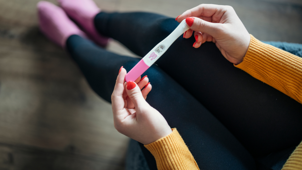 Positive Pregnancy Test but No Symptoms: 7 Reasons