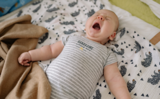 When Can a Baby Hold a Bottle?